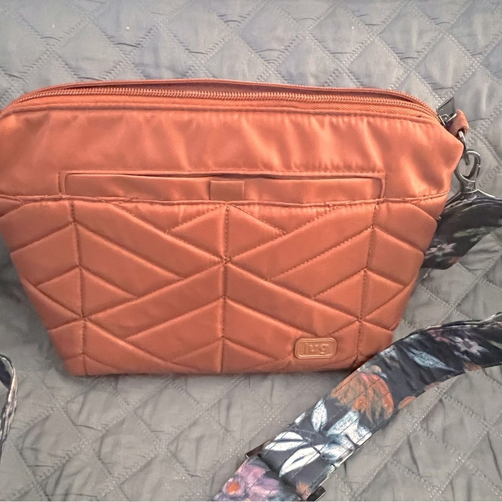 Brand new without tags, Lug Flare Crossbody Bag in copper/bloom navy.